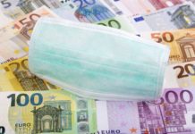 Weitere Bundesländer legen Soforthilfe-Programme wegen der Corona-Krise auf Protective mask on a Swiss money background