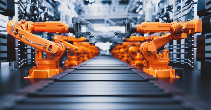 Robotic arms along assembly line in modern factory. Im Interview gibt Unternehmerin Nina Jäger Einblicke in den Aufbau und die Entwicklung ihres Unternehmens.