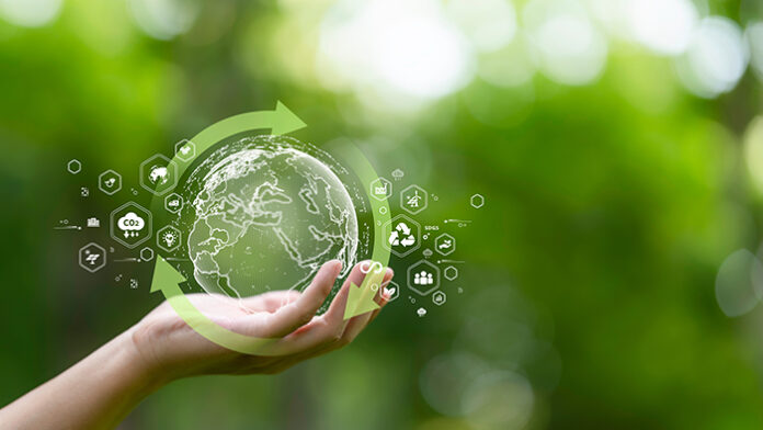 hand holding digital earth with circular economy concept. renewa