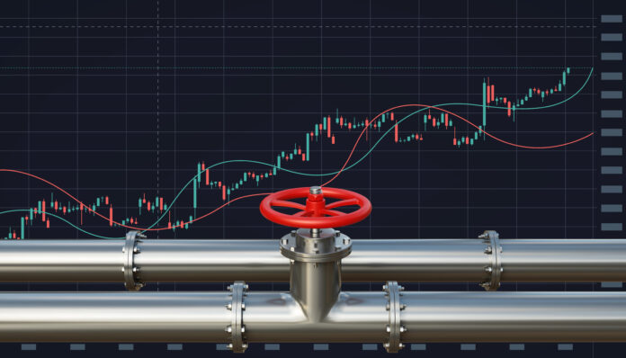 Pipeline with red valve and graph chart. Changes in prices in energy market concept
