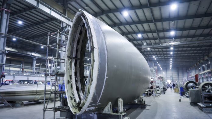 Industrial Manufacturing Facility with Aircraft Component in Progress