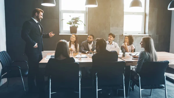 depositphotos_258991150-stock-photo-business-colleagues-discussing-project-plans