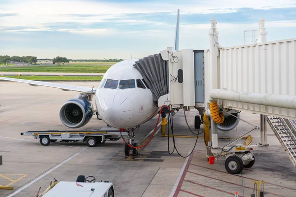 depositphotos_697403784-stock-photo-aircraft-being-refueled-serviced-airport